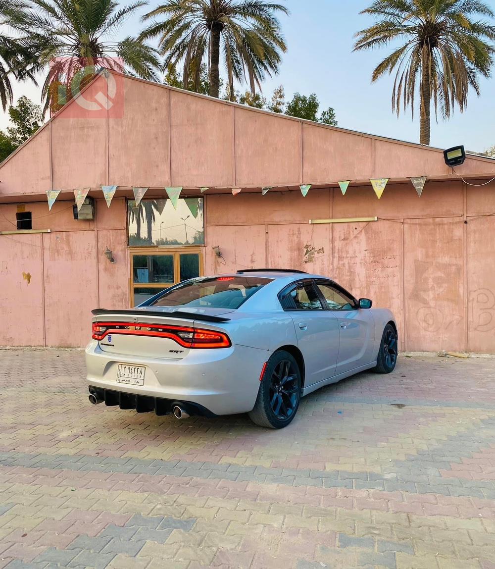 دۆج چارجەر